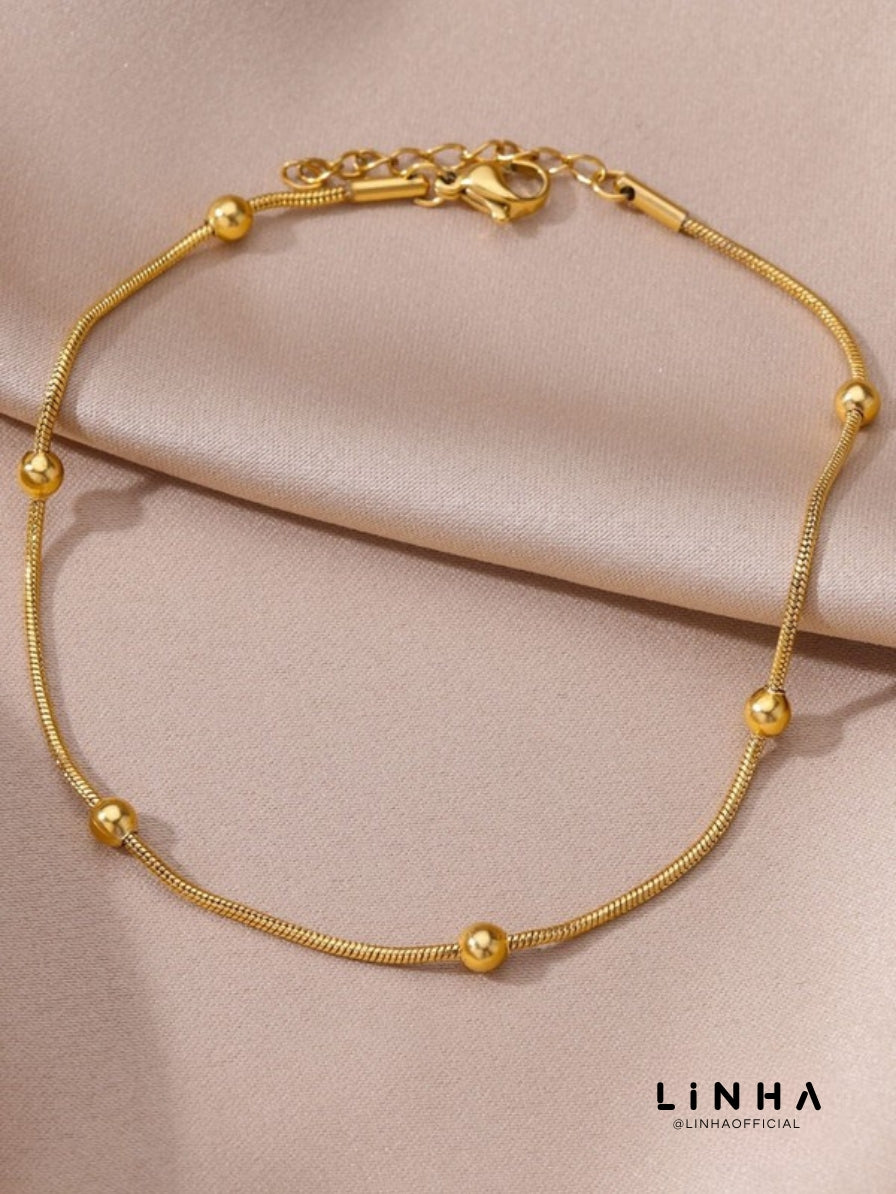 Tornozeleira Pontos de Ouro